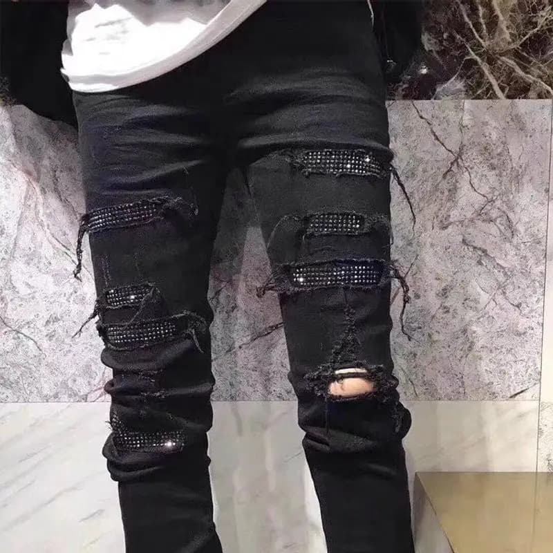 Moda coreana Jeans da uomo Nero Ruffian Bello marchio alla moda Hot Diamond Strappato Mendicante Slim Primavera Autunno Pantaloni casual elastici