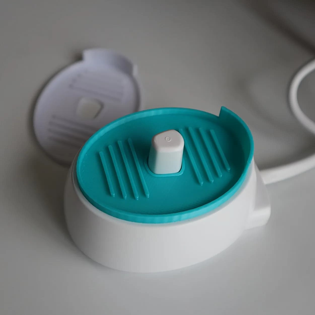 Protective pad for charging base for electric toothbrush, 2 pieces, to drain the water and keep the charging base free from dirt and residues