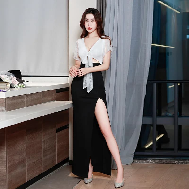 Abiti da sera eleganti in stile francese molto richiesti: vestito da festa senza schienale con design aderente monopezzo e dettagli a contrasto