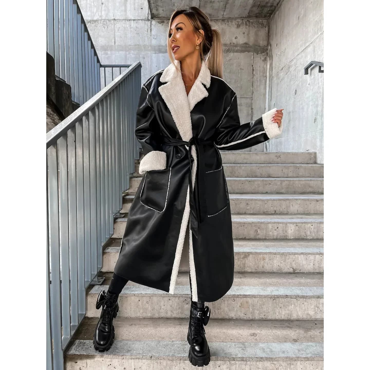 Autunno/Inverno nuova giacca a vento ispessita in pelle casual con tasche giacca a vento lunga con cintura cappotto alla moda allentato per le donne