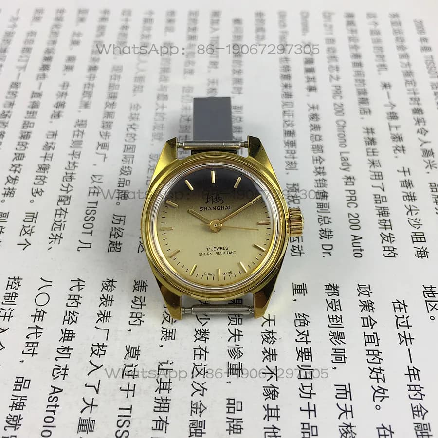 Orologio da donna meccanico manuale con cinturino a strisce gialle marca Shanghai, diametro 25 mm, 1 cinturino in omaggio.