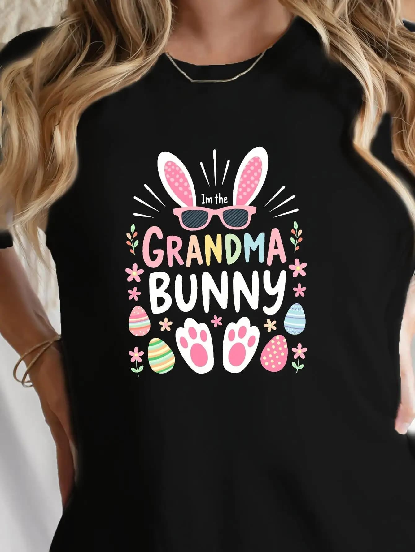 Women's T-shirt "I'm the Grandma Bunny" for Easter - Short sleeve top with round neckline and print with bunny and eggs, casual spring summer