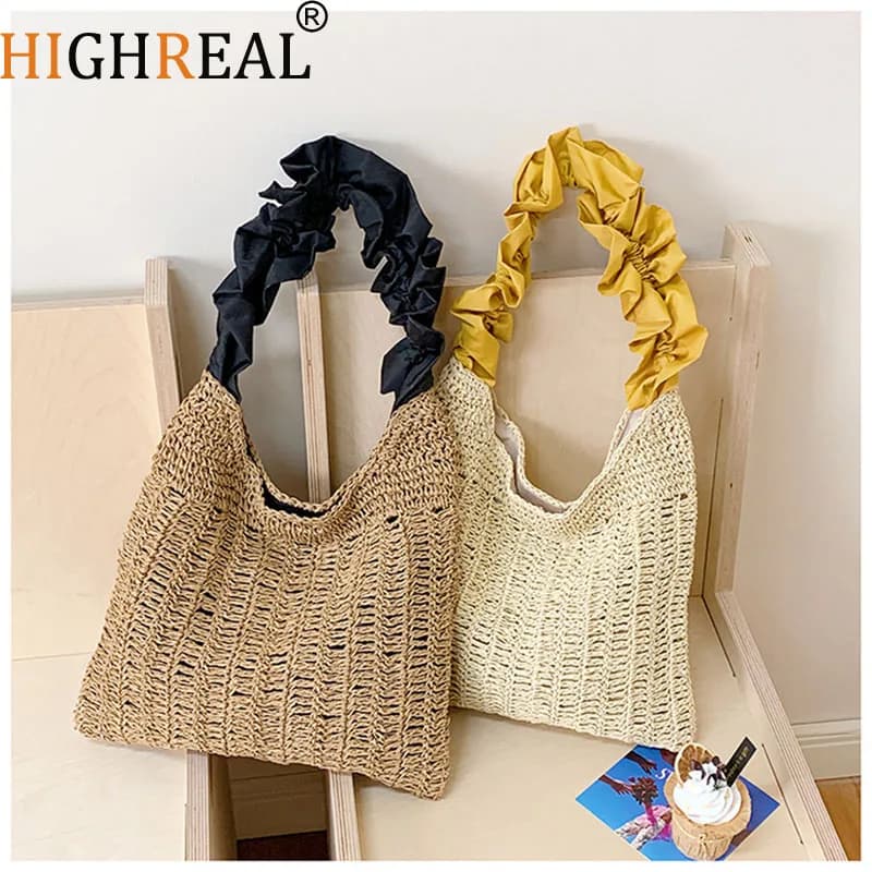 Borsa da donna in tessuto da spiaggia cava Borsa a tracolla di nicchia per le vacanze Borsa in paglia stile tempo libero Nuovo pendolare a mano pieghettato