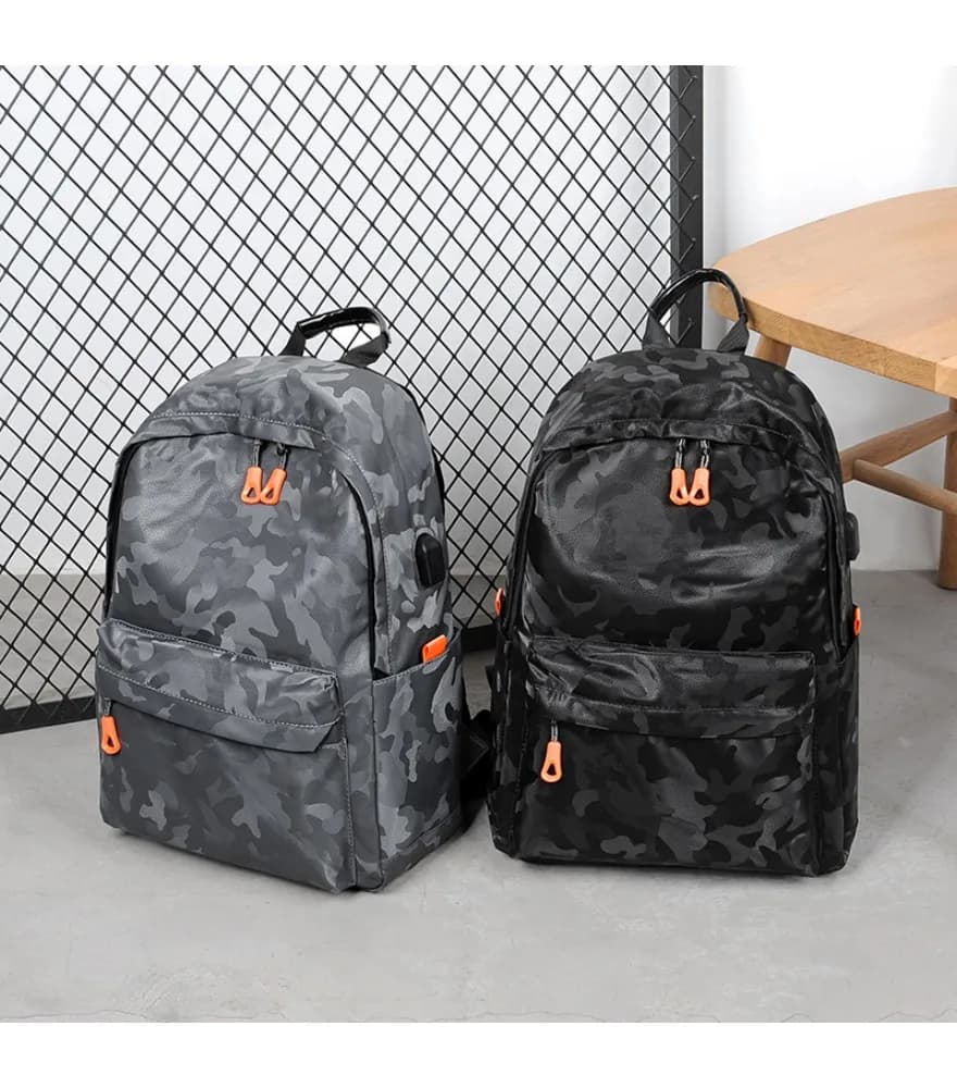 Black camouflage print backpack with orange zipper pulls anti splash side external USB for teen school outdoor casual trips