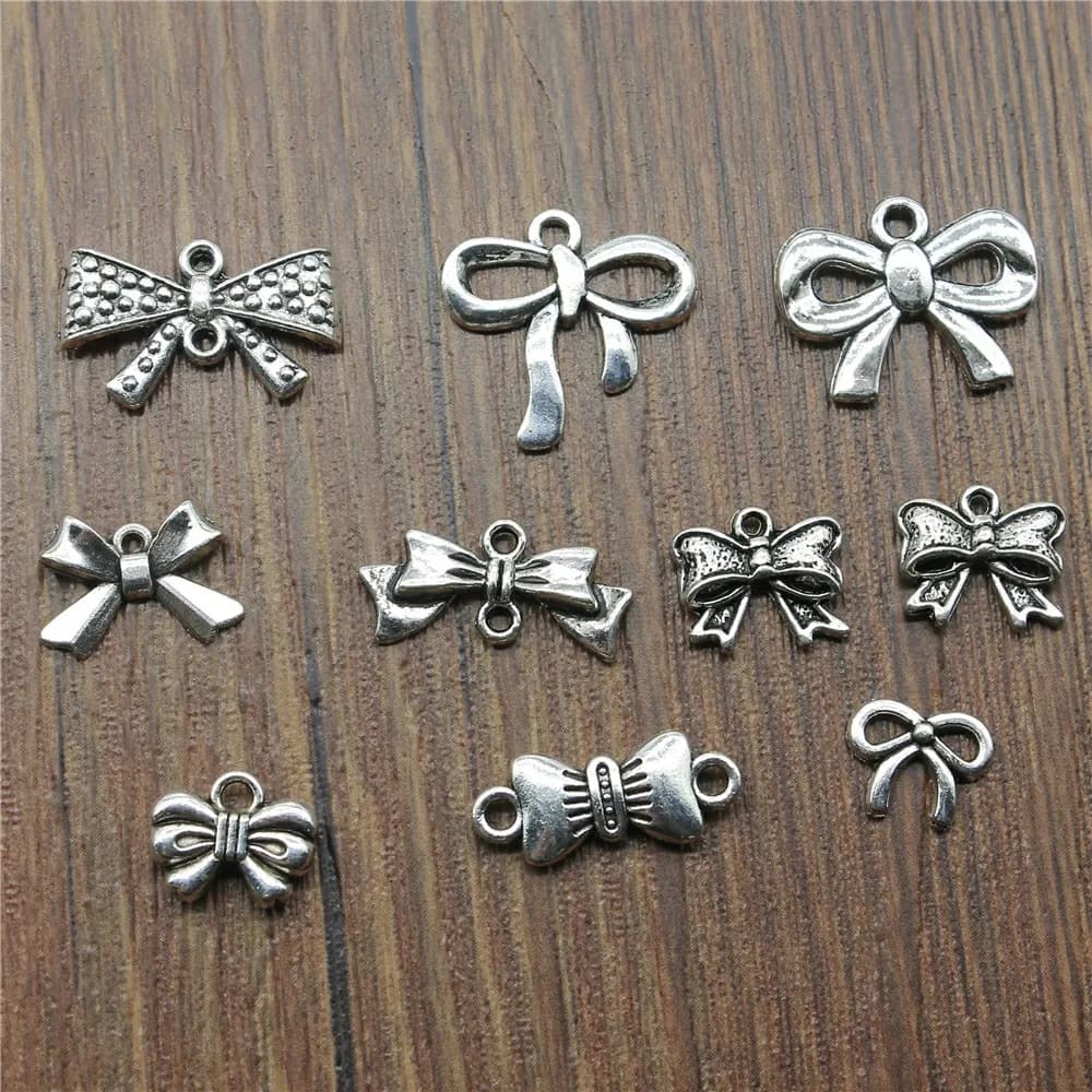 20 pz Charms piccolo fiocco argento antico colore Bowknot Charms risultati dei monili fai da te Bowknot Charms all'ingrosso