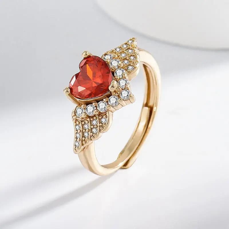 Anello in oro champagne con zirconi rossi melograno a forma di cuore romantico di lusso leggero, regalo di gioielli alla moda e versatile