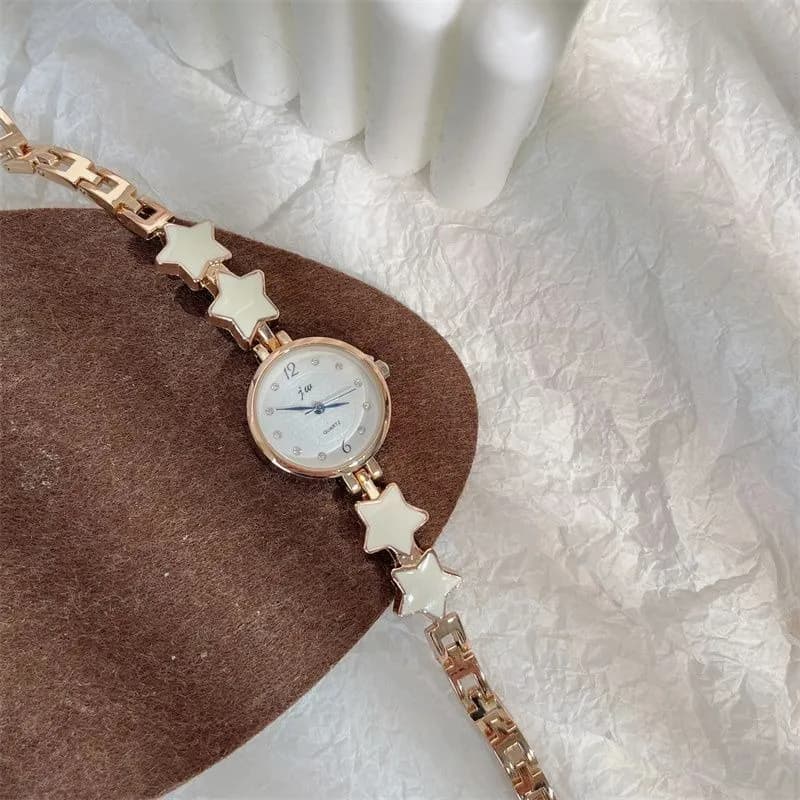 Orologio da polso con catena a forma di stella e luna, orologio da donna giapponese coreano semplice ed elegante, orologio da polso al quarzo alla moda per ragazze adolescenti e studentesse
