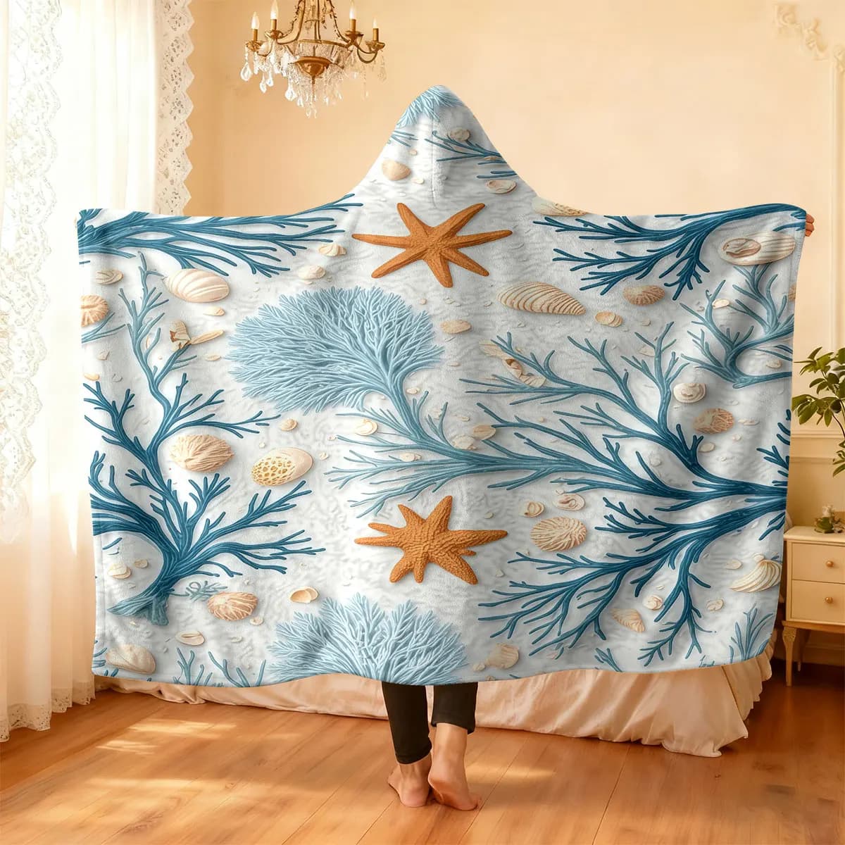 A flannel hoodie with a marine pattern featuring blue coral orange starfish shells blanket multiple sizes