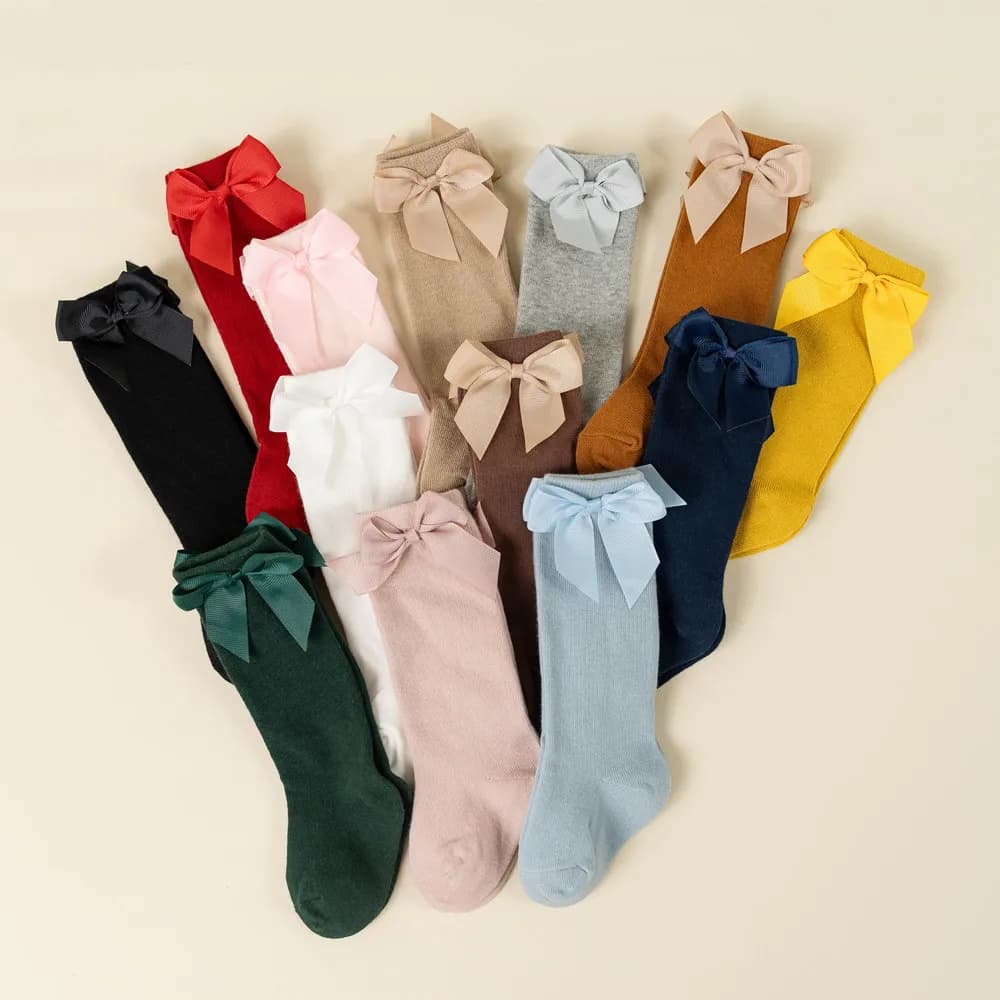 Calzini per bambini di nuova marca Autunno Inverno Bambini Ragazze Calzino lungo al ginocchio in cotone con fiocco grande Calzini da pavimento per bambini in stile spagnolo