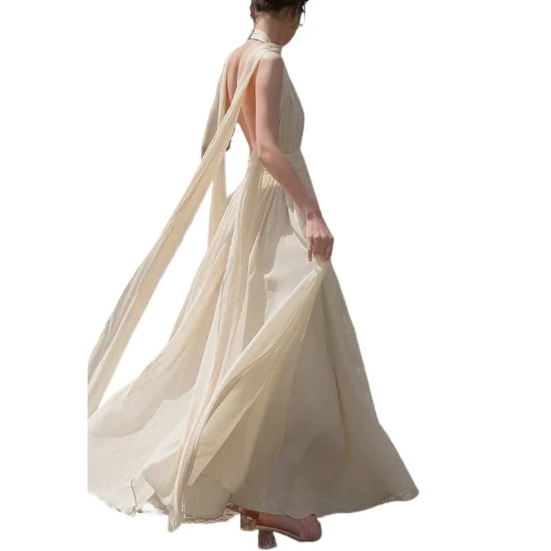 Abito in chiffon color albicocca senza maniche e senza schienale, elegante e raffinato, perfetto per le vacanze e per il tempo libero, nuovo modello 2026