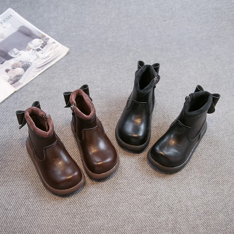 Stivali in pelle per bambini con fiocchi posteriori Stivali da principessa alla moda per ragazze Versatili stivaletti invernali per bambini nuovi stile coreano 2025