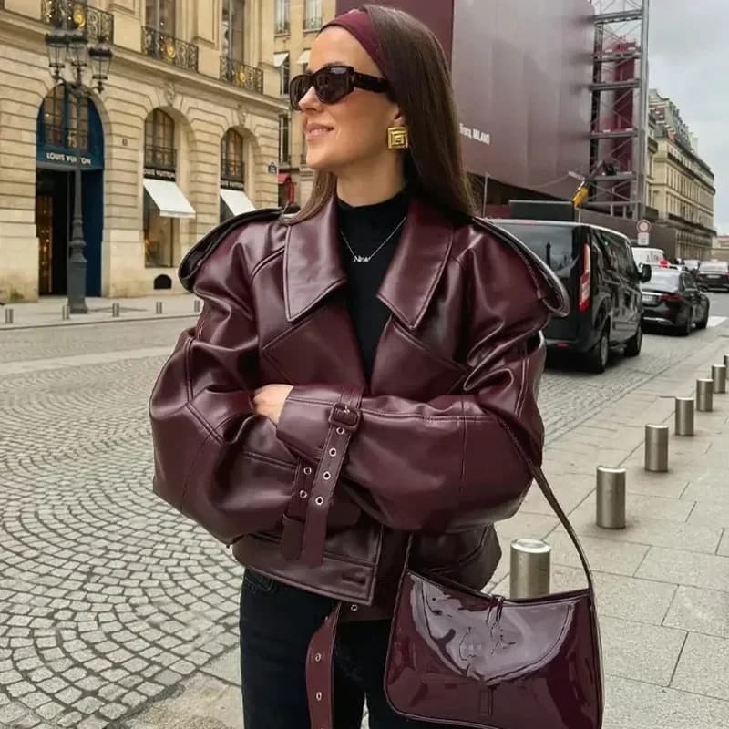 Cappotto corto con cintura in pelle PU moda donna elegante giacca a maniche lunghe con cerniera tasca in PU 2025 abbigliamento streetwear New Lady