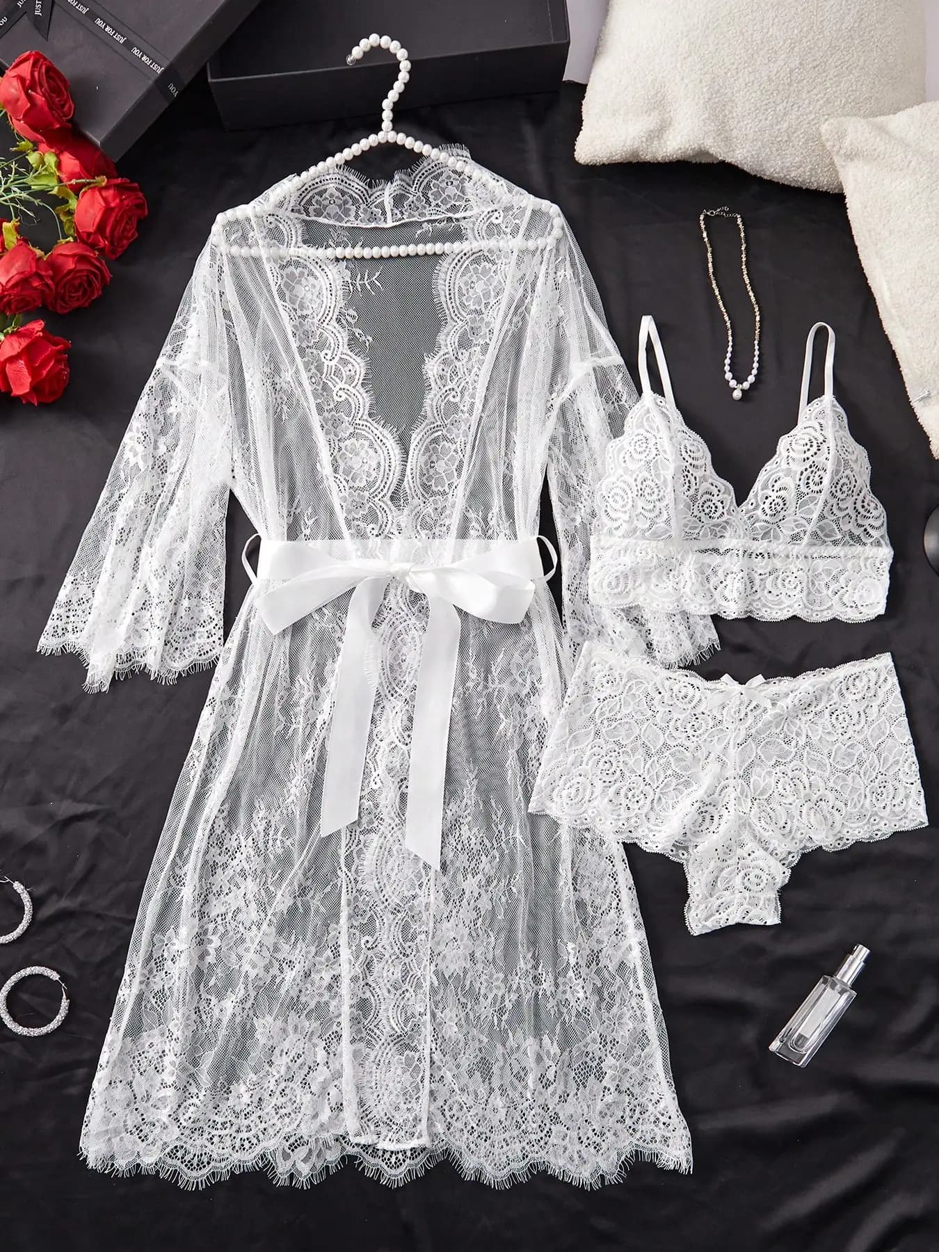 Set of white lace robe with deep V neckline and bralette matched with satin belt