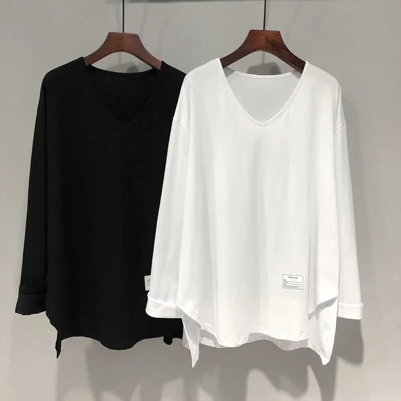 Primavera nuovo sottile orlo diviso Plus Size T Shirt top manica lunga scollo a V lettera stampa pullover larghi moda Casual abbigliamento donna