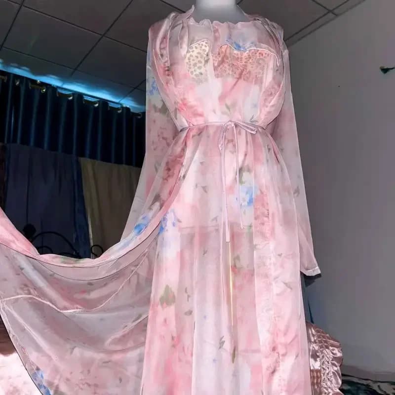 Nightdress with transparent braces printed in pink silk Dress with suspenders Dress with volant Dress with belt Night shirt with silky touch Strong cuts