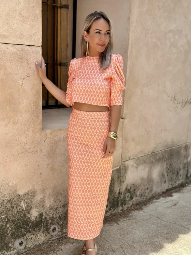 Top corto da donna con gonna all'ombelico a maniche lunghe Set Top corto moda primaverile a vita alta Mezza gonna stampata divisa Set da due pezzi