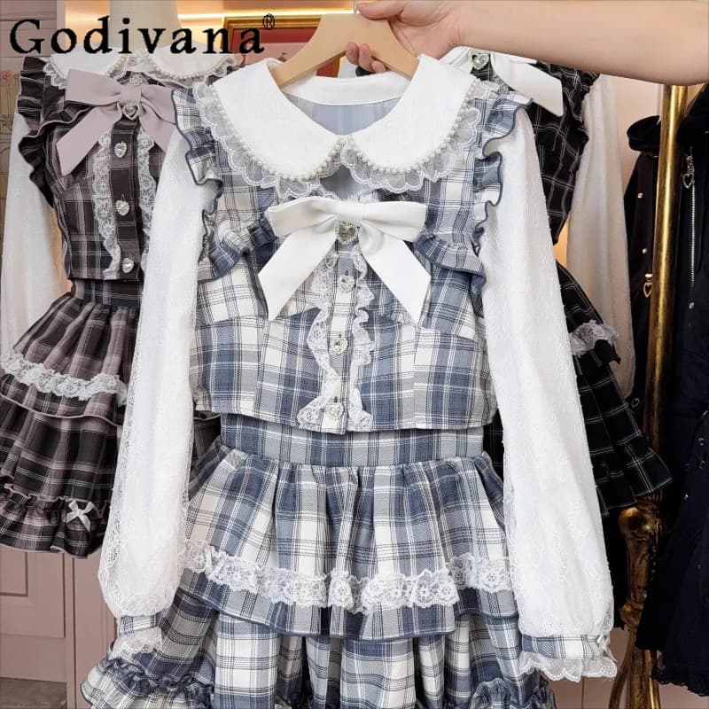 Gonna camicia scozzese dolce prodotta in serie giapponese Set da 2 pezzi Autunno Nuove ragazze Top a maniche lunghe con fiocco carino e gonna Abiti da donna