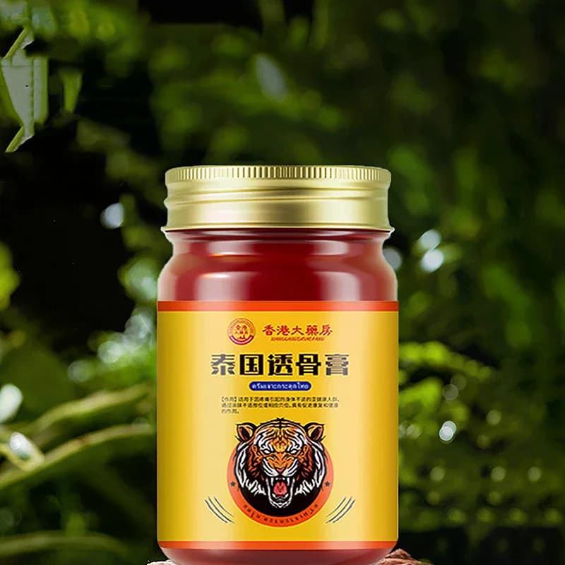 Medicina tradizionale tailandese: unguento balsamo di tigre rosso per dolori articolari, muscoli e artrite, crema lenitiva per il prurito.