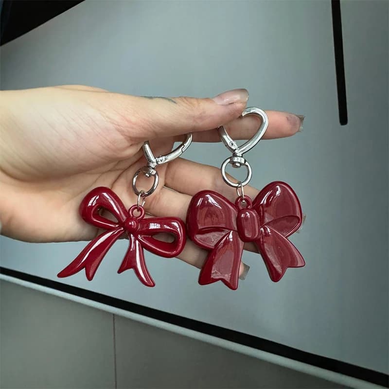 Portachiavi con ciondoli a forma di cuore rosso dal temperamento squisito, versatile ciondolo per telefono, zaino alla moda, ornamenti appesi, accessori, regali