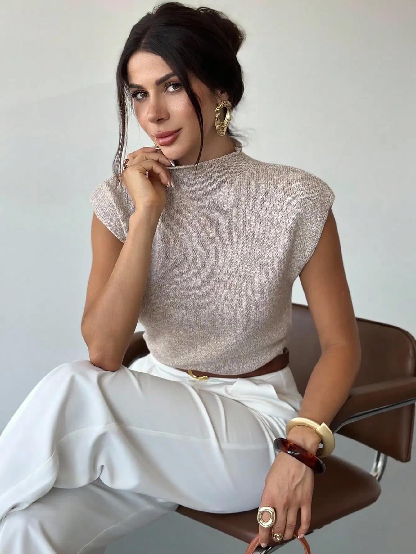 Elegante gilet in maglia senza maniche con collo alto da donna, top casual per l'autunno inverno