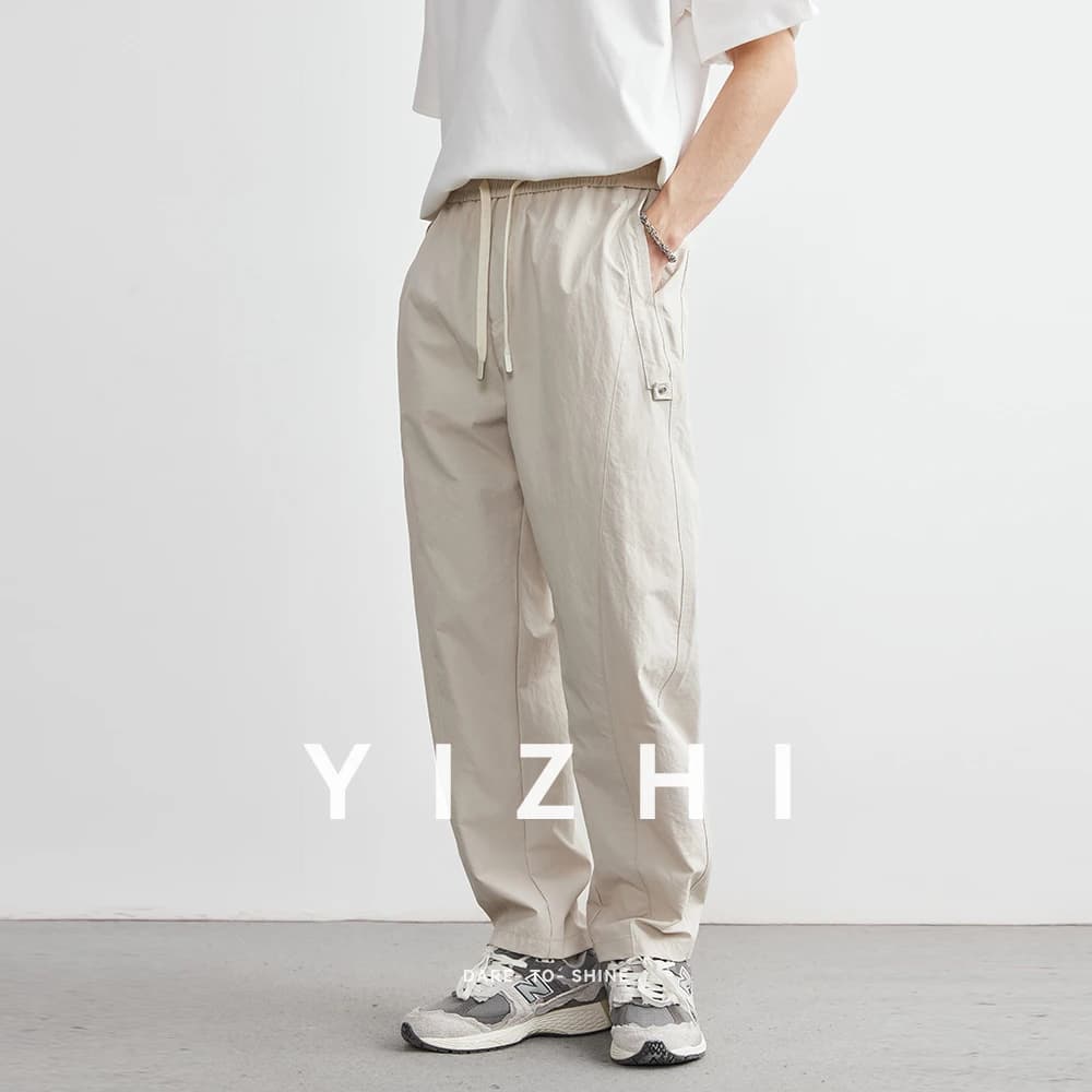 Pantaloni casual dritti da uomo Estate nuovo stile con coulisse Pantaloni larghi leggeri ad asciugatura rapida Pantaloni alla moda in tinta unita