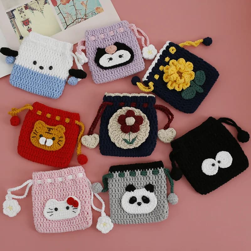 2025 Nuovo cartone animato alla moda Borsa con coulisse intrecciata a mano Borsa per monete con coulisse all'uncinetto per ragazza tessitore Borsa piccola con animali carini