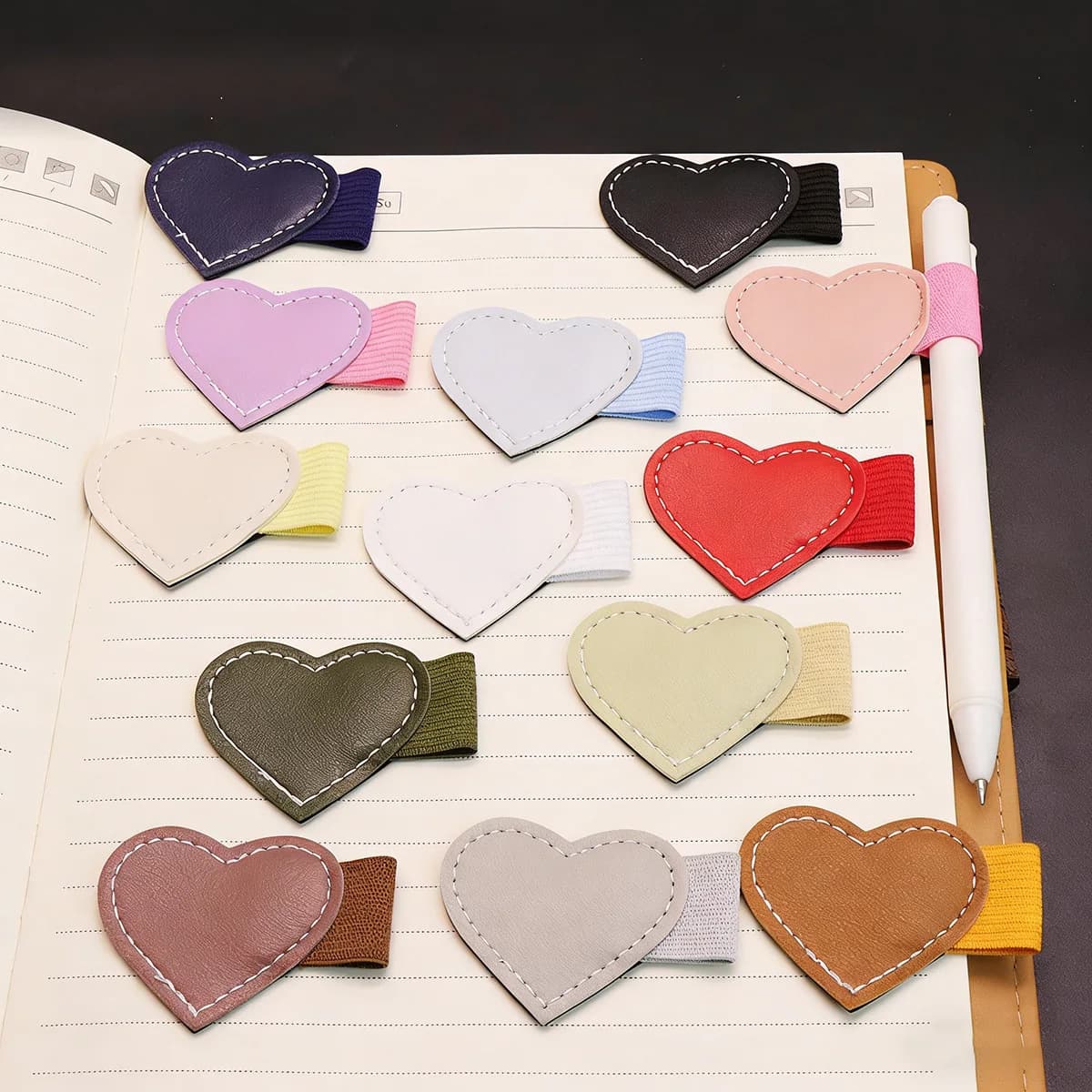 Heart-Shaped Faux Leather Pen Case, Designed Specifically for Notebooks, Journals, Planners, and Tablet Protective Cases This Self-Adhesive Pen Holder Comes with an Elastic Band, Suitable for Pencils, Touch Screens, Book Pages, Laptop Pens, and Apple Pencil.