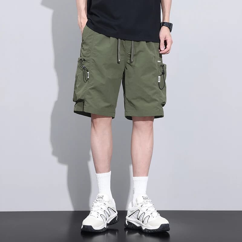 2025 Pantaloncini sottili estivi da uomo Pantaloni cargo Tasche laterali Pantaloni larghi Bermuda al ginocchio Pantaloni corti da basket Uomo M-4XL