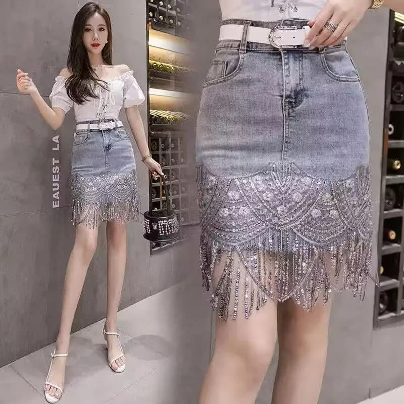 Paillettes Nappe Gonna di jeans 2025 Estate Autunno Pacchetto donna Hip Gonna di jeans blu Stile coreano Gonna bling sexy Culottes femminili