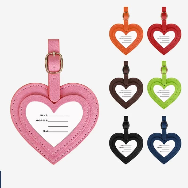 Etichetta per bagagli semplice in pelle PU per donna uomo Etichette per carte pendenti anti-perdita per carte d'imbarco a forma di cuore in PU colorato