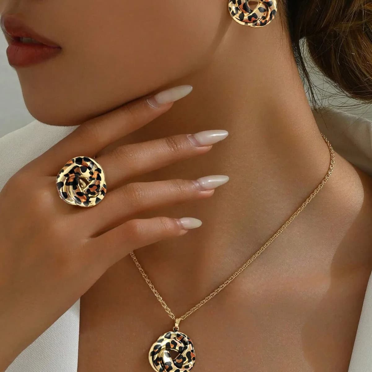 Simple and stylish knotted earrings irregular leopard print ring pendant necklace set