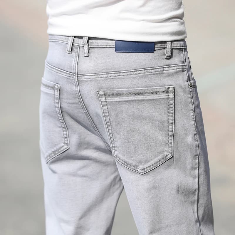 Jeans Uomo Nuovi di Zecca Estate 2026, Modello Dritto e Ampio, Sottili, Casual Semplici, in Cotone Elasticizzato Leggero Grigio Chiaro