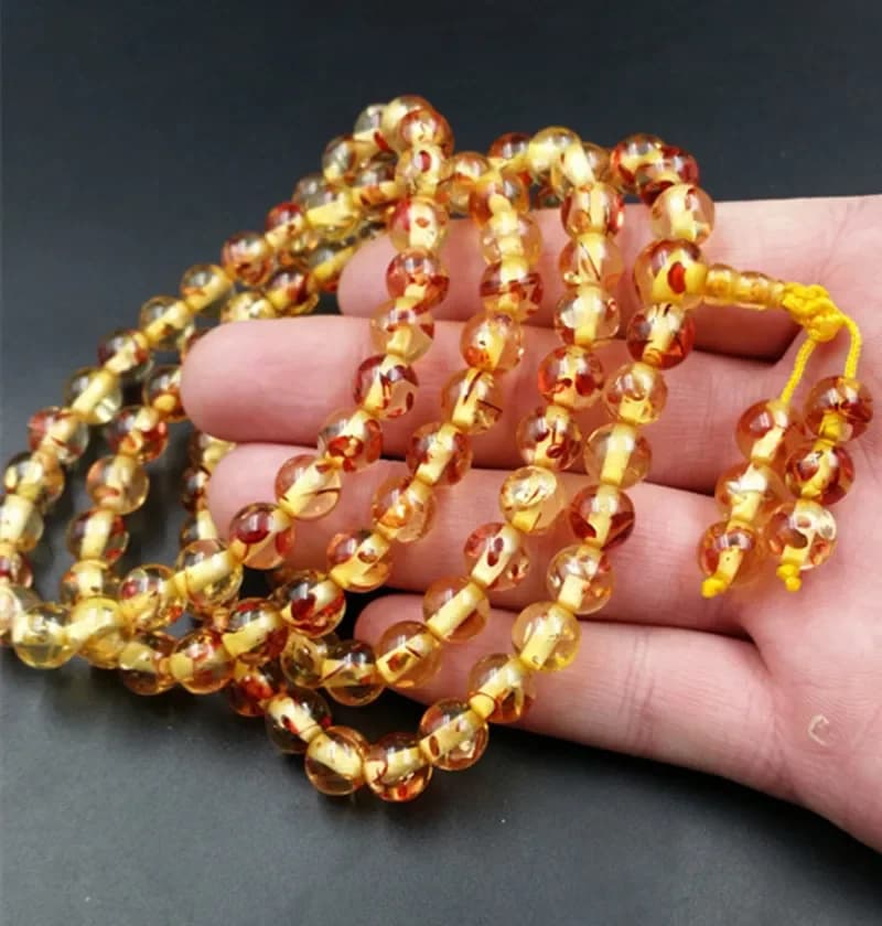 Bracciale multicerchio con cera di miele ambra naturale olio di pollo giallo 108 Bracciale con perline di Buddha impeccabile in cera di miele per uomini e donne