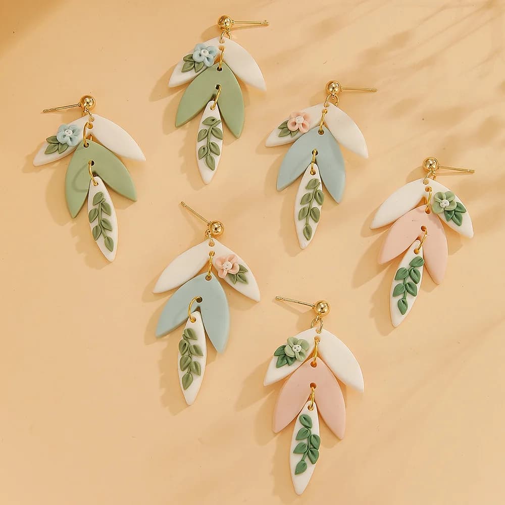Orecchini in ceramica morbida fatti a mano in nuovo stile natalizio alla moda Orecchini da ragazza dolce con fiore a foglia tridimensionale lunga da donna