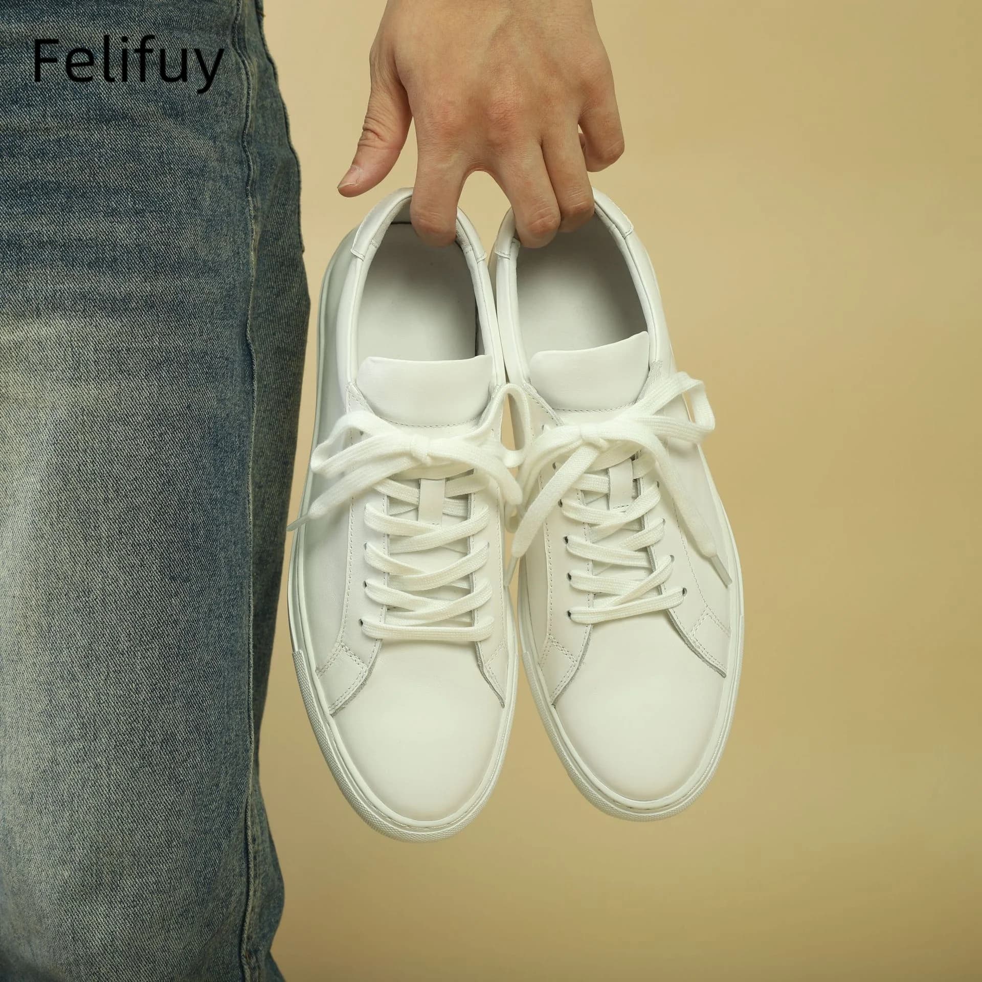 Scarpe basse casual da uomo bianche Scarpe da ginnastica stringate a testa tonda in vera pelle alla moda Scarpe basic da mucca nere Scarpe autunnali casual da uomo