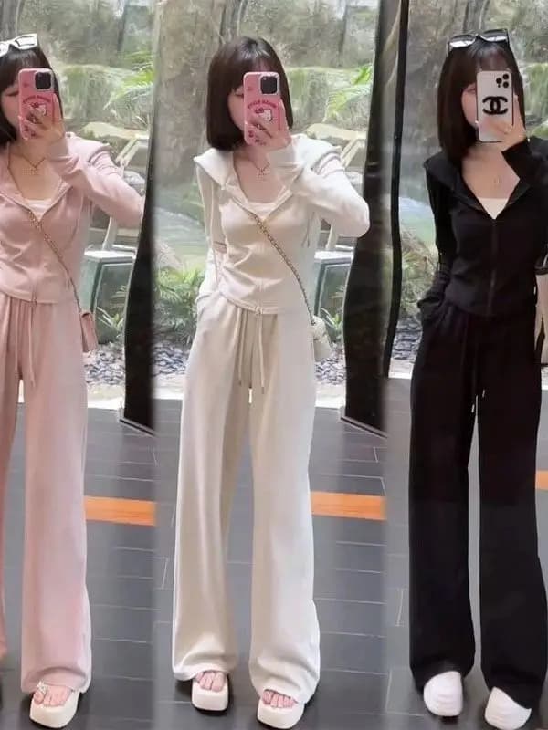 Set di abbigliamento sportivo casual alla moda da donna, felpa con cappuccio ampia e snellente, pantaloni a gamba larga, nuovo stile coreano per primavera e autunno