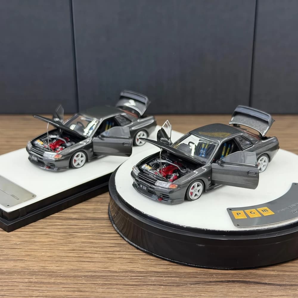 Modello di auto pressofuso PGM 1:64 GTR R32