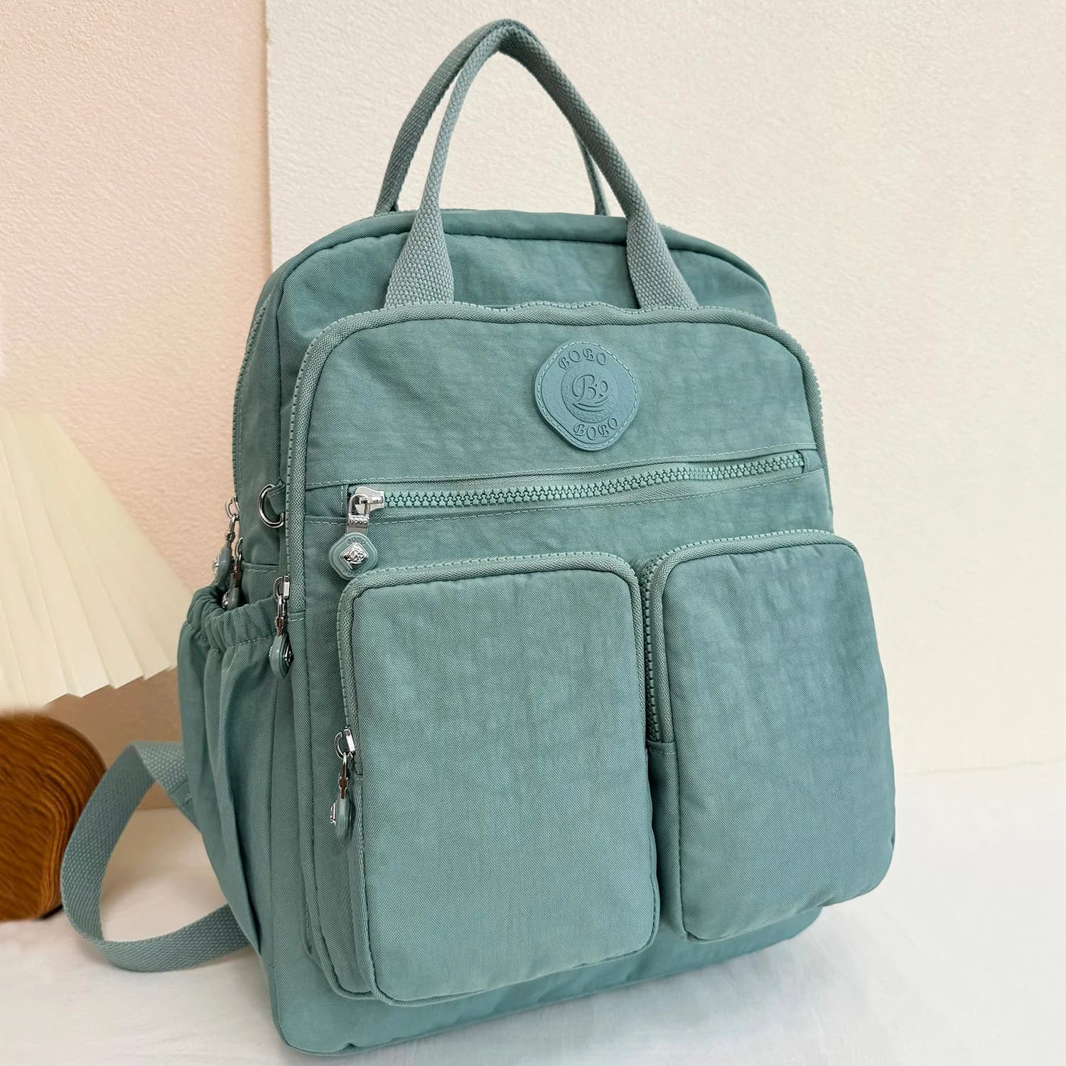 Zaino da donna Multi-tasca alla moda zaino da viaggio in Nylon tinta unita con manico morbido zaini da scuola Casual leggeri