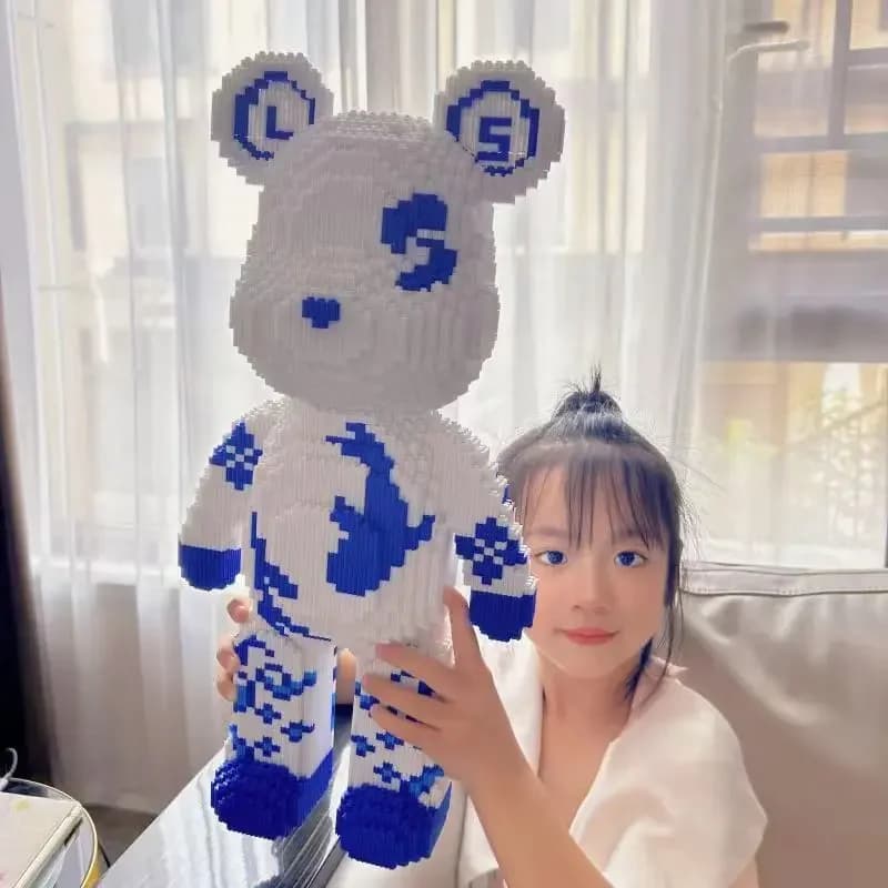 Giocattolo puzzle per bambini con assemblaggio di piccole particelle di orso violento in porcellana blu e bianca in stile cinese