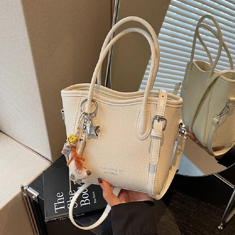 Borsa fasciatoio ideale per piccoli oggetti con scomparti dedicati per ciucci, massaggiagengive e altri piccoli articoli