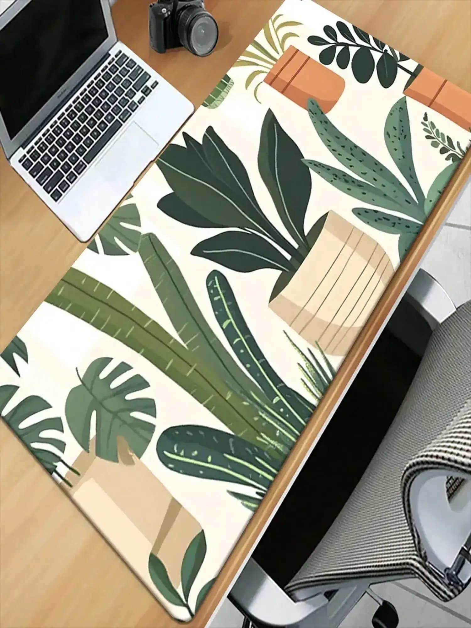 Large Waterproof And Non-Slip Leaf Mouse Pad & Desk Mat - Available In Green, Blue, And Beige Plant Leaf Patterns With Monstera Deliciosa And Palm Leaf Designs. Features A Non-Slip Rubber Base. Suitable For Offices, PCs, Laptops