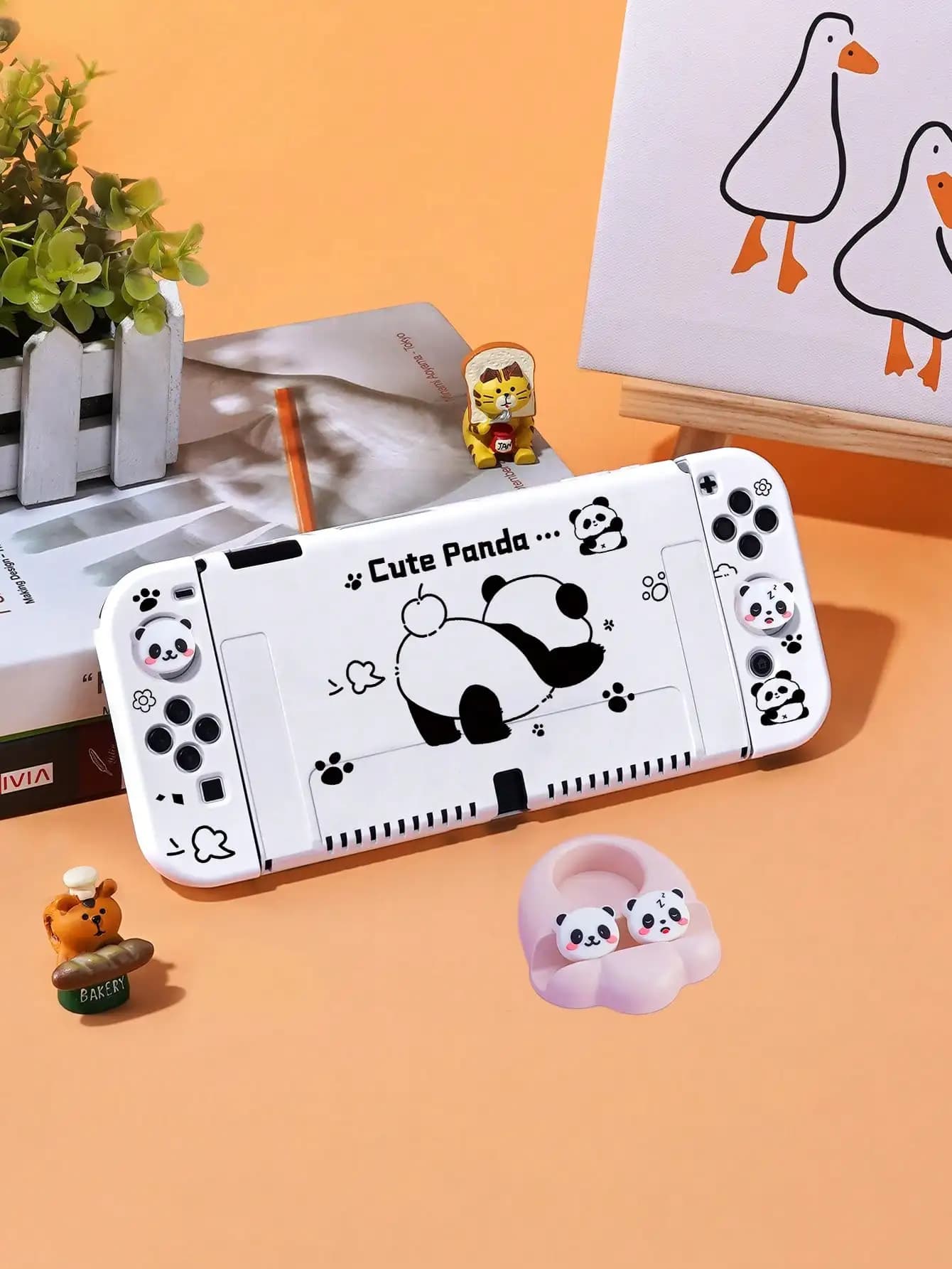 Confezione di custodie protettive per panda simpatico cartone animato da 1 pezzo con cappucci antiscivolo da 4 pezzi per Nintendo Switch OLED