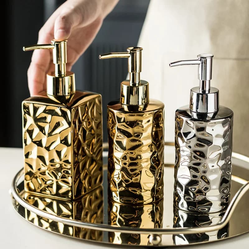 Bottiglia di Dispenser di sapone e Gel in ceramica irregolare di lusso creativo nastro dorato bottiglia di Shampoo vuota accessori per la conservazione del bagno