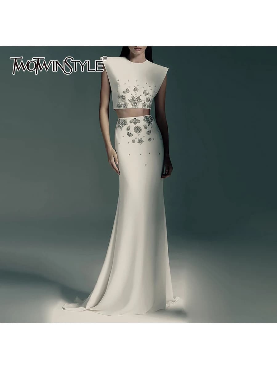 TWOTWINSTYL Dimagrante Diamanti Impiombati Set di Due Pezzi per Le Donne O Collo Gilet Senza Maniche A Vita Alta Gonna Lunga Elegante Set Femminile