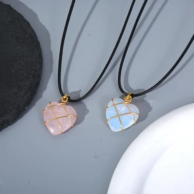 Plain cross-border hot-selling powder crystal protein love pendant handmade copper wire winding silk peach heart necklace jewelry batch