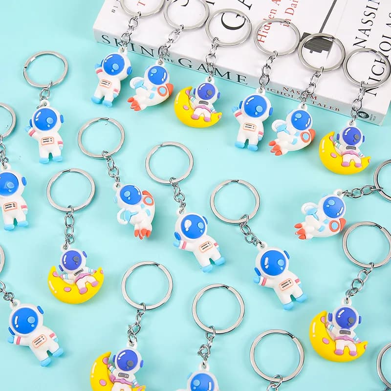 10 pezzi di astronauti del fumetto portachiavi in PVC ciondolo zaino per bambini spazio esterno tema festa di compleanno bomboniere regali pinata riempitivi