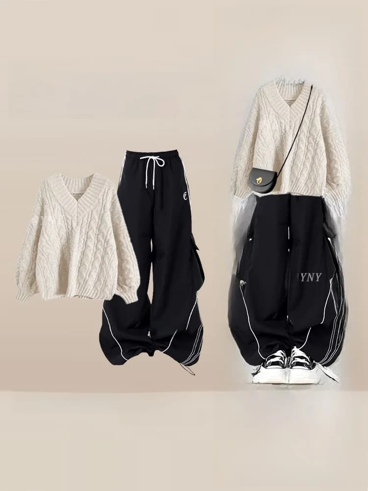 Completo due pezzi da donna taglie forti per l'inizio dell'autunno: maglione ampio e pantaloni a gamba larga, stile casual, scollo a V, lungo, che nasconde le imperfezioni e snellisce.