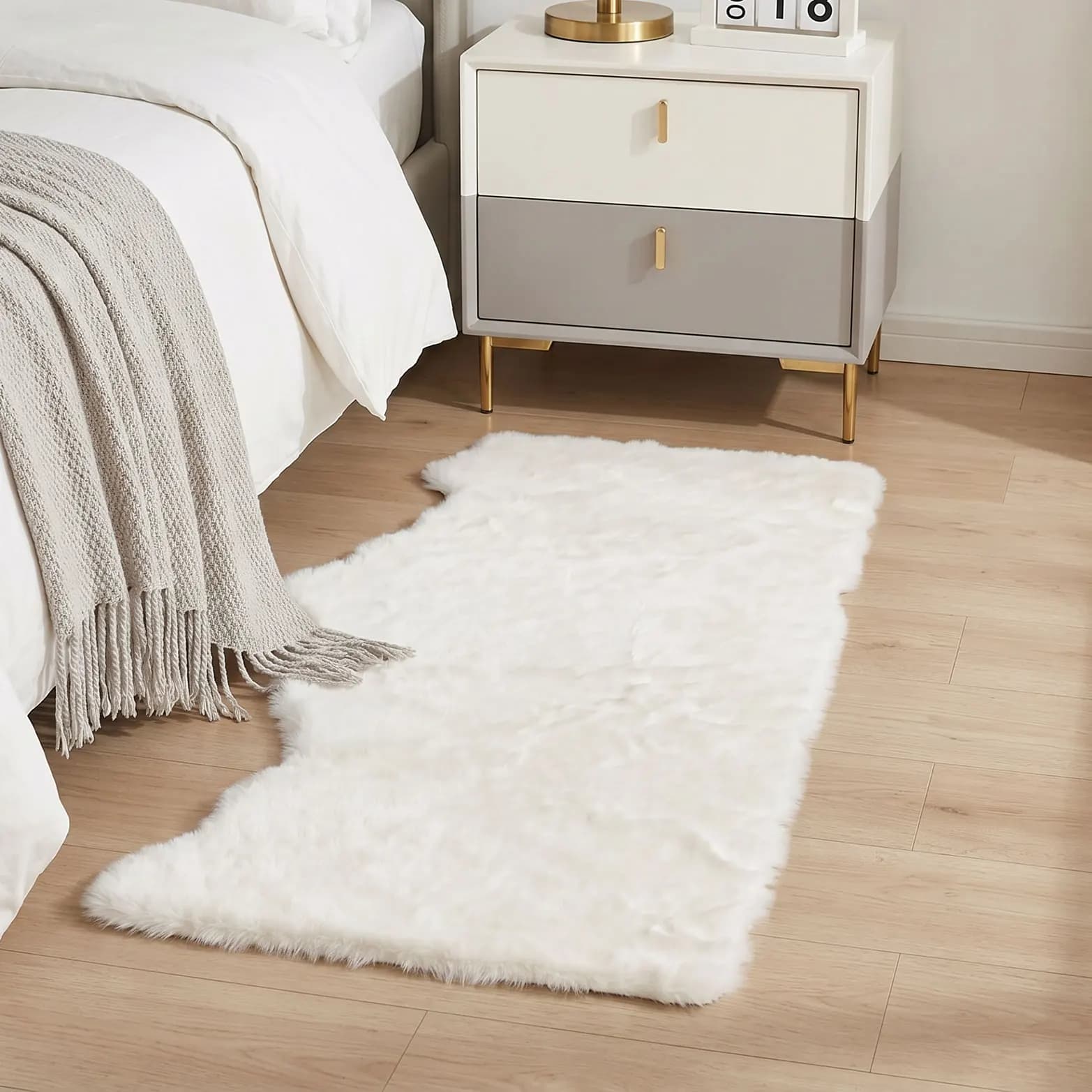 An Irregular-Shaped Faux Rabbit Fur Bedside Rug, a Washable Cushioning Decorative Mat in a Light Luxury Style for the Bedside Table