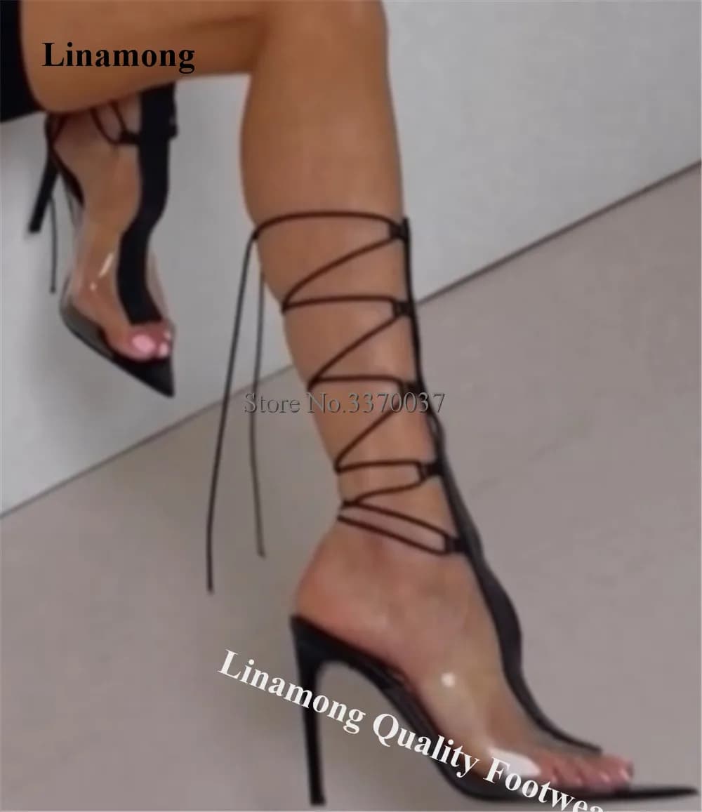 Sandali Gladiatore Linamong con Tacco a Spillo in PVC Trasparente, Punta Aperta, Cinturini Neri Incrociati e Tacco Sottile