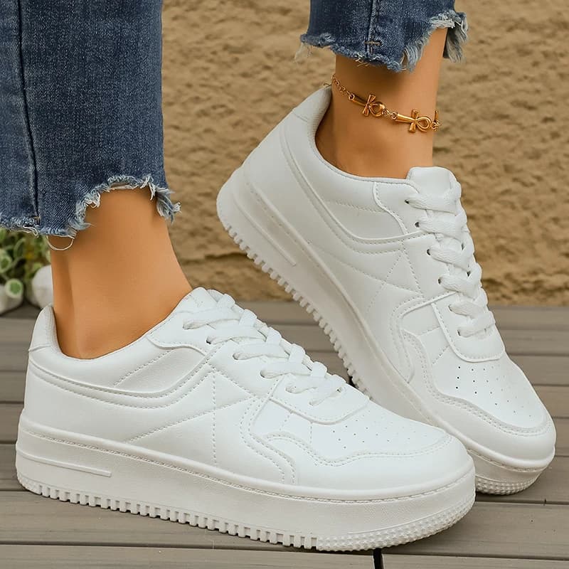 Sneakers bianche basse con suola spessa per donna 2026 Scarpe sportive con plateau in pelle PU primaverile Scarpe da corsa casual antiscivolo da donna